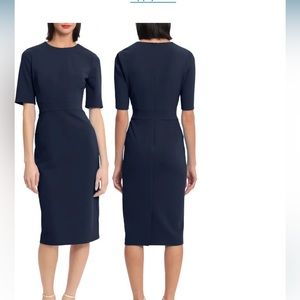 Donna Morgan sheath dress. Slightly taken in at waist. Short sleeve. Dark navy